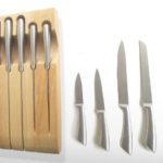 Ceppo in legno più coltelli