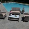 Salotto polyrattan grigio con cuscini